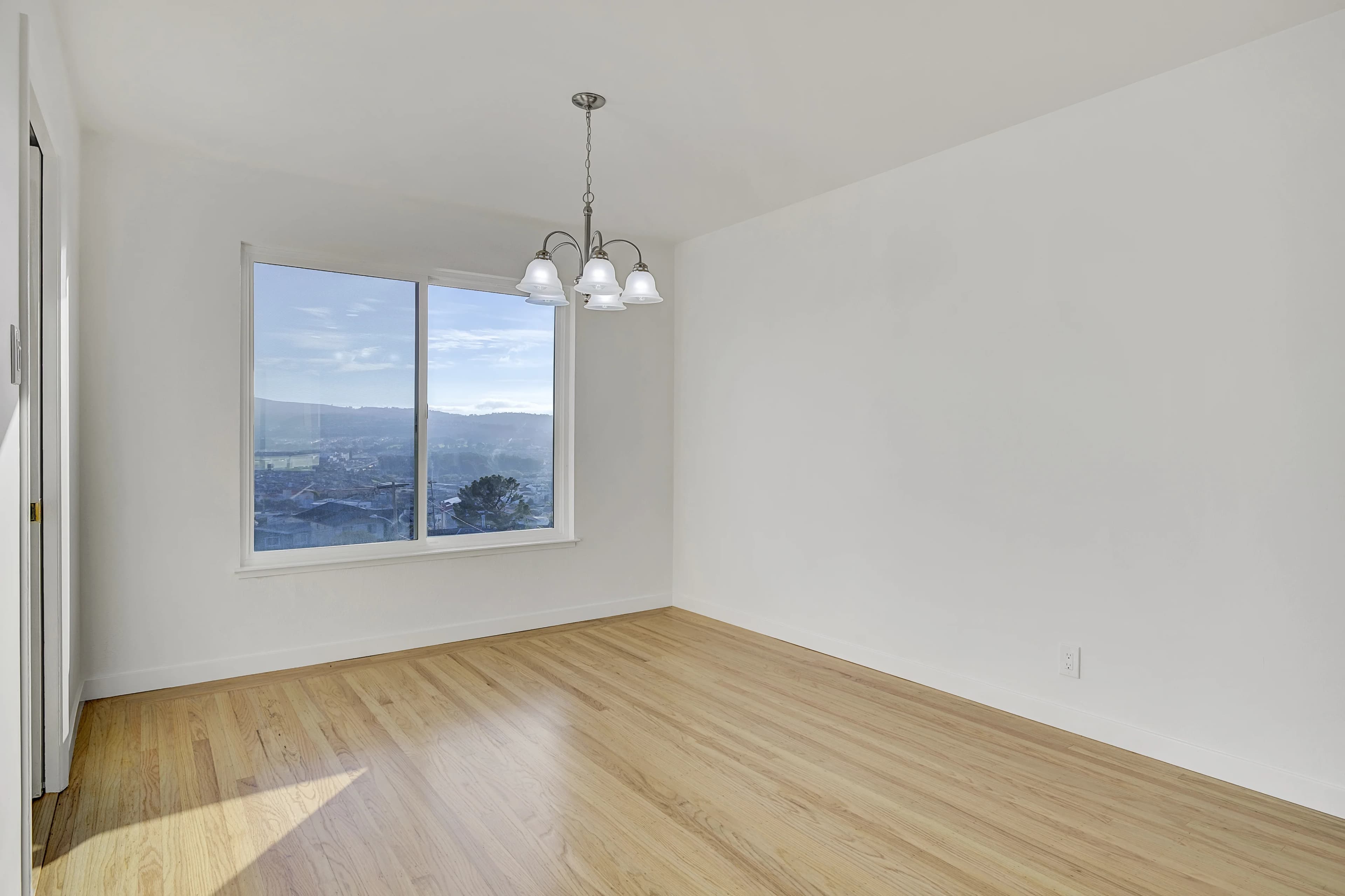 Empty dining room before virtual staging